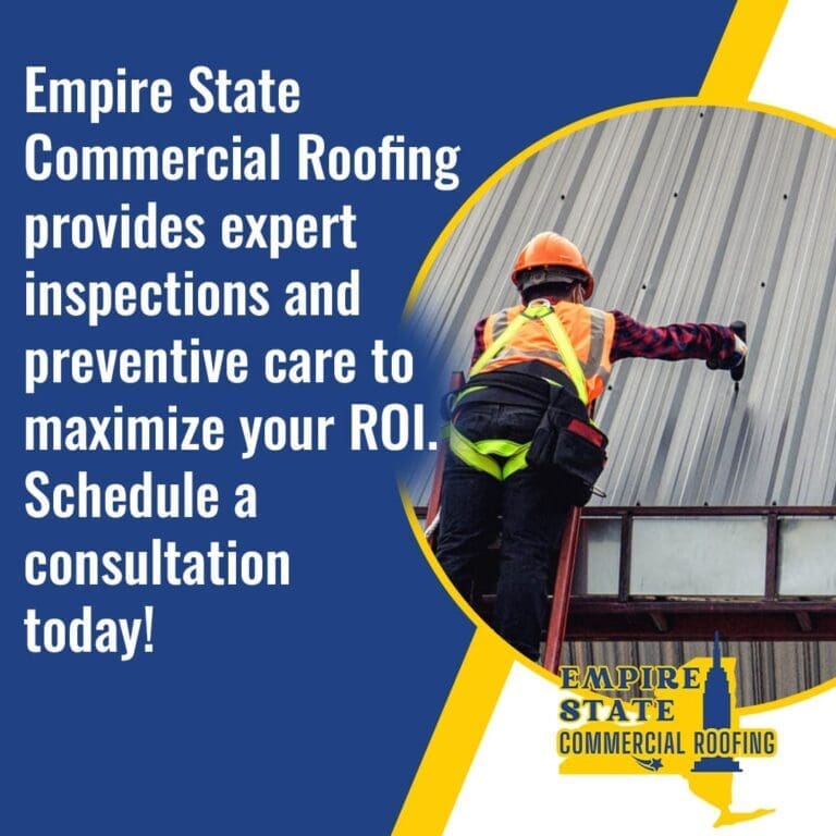 A commercial roofer in a harness, hard hat, and safety vest climbs a ladder to inspect a metal commercial building wall/roof junction.